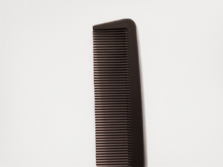 Needle-handled comb with compartment function